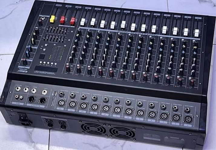 PMX1208DU 12-channel powered audio mixer.
